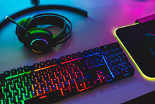 Gear Equipment At Gamer Workspace - Rgb, Keyboard, Headphones And Mouse