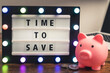 Time to save phrase written on marquee lightbox - savings concept. High quality photo
