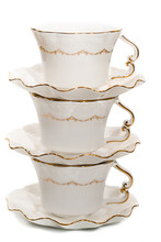 Decorated Tea Cups On White Background