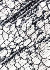 Wall Mural - Cracked white paint on fabric as an abstract background.