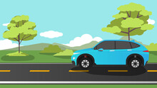 Horizontal View Of EV-Car Driving On Asphalt Road.  Background Of Trees And Green Grass And Mountain. Under The Blue Sky.