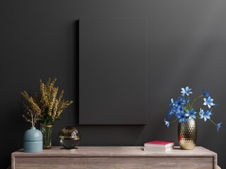 Mockup dark frame on cabinet in living room interior on empty black wall background.