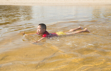 Wall Mural - boy swimming