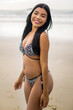 © YURI - brazilian woman in bikini on the beach during summer