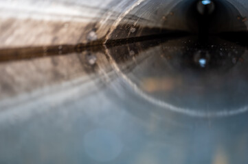 water surface level view from inside a concrete culvert