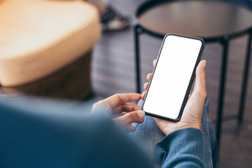 cell phone blank white screen mockup.hand holding texting using mobile on desk at office.background empty space for advertise.work people contact marketing business,technology