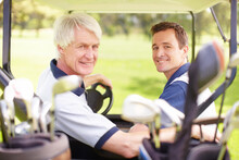 Golfing Buddies. Golfing Companions On The Golf Course In A Golf Cart.