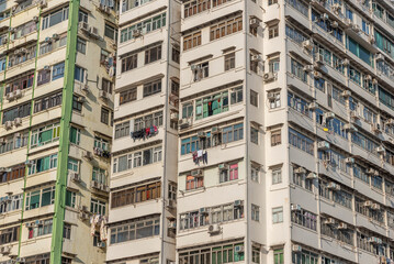 Wall Mural - Exterior of crowded high rise residential building in Hong Kong city