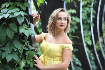 Wall Mural - Beautiful girl in the summer park