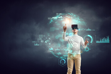 Wall Mural - man wearing virtual reality goggles