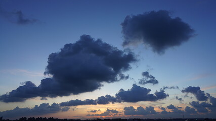 Wall Mural - the beautiful sunset view with the colorful clouds and sky in the city