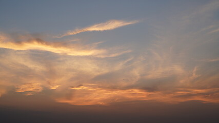 Wall Mural - the beautiful sunset view with the colorful clouds and sky in the city