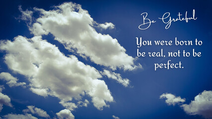 Motivational quote - You were born to be real, not to be perfect. With blue sky background.