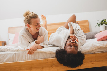 The best friends are relaxing at the spa and discussing secrets