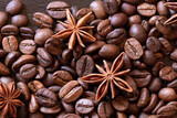 Fototapeta Boho - coffee beans with star anise flowers close-up. view from above