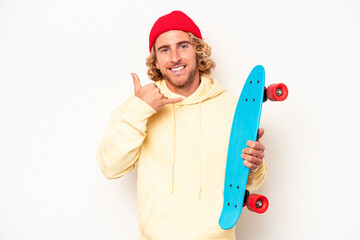 Wall Mural - Young skater caucasian man isolated on white background showing a mobile phone call gesture with fingers.