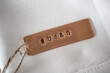First name Susan identity engraved name dog tag copper metal name plate badge. Shiny and clean stamped letters on retro trinket pendent.