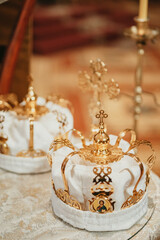 Pair of golden crowns n the church. Orthodox religious crowns.