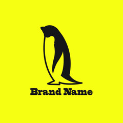 Wall Mural - Penguin logo on a yellow background is perfect for your product