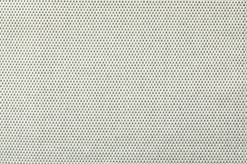 Knitted texture. Texture of jacquard fabric with gray geometric pattern. Crochet mosaic pattern.