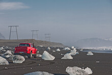 Customised Truck Driving On Beach In Iceland
