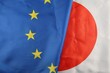 EU and Japan flag close-up
