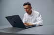 © SHOTPRIME STUDIO - Asian man in a white shirt work laptop fatigue executive