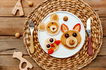 Wall Mural - Colorful breakfast meal for kids. Funny Easter food art, top view. Concept of healthy eating, baby food, healthy breakfast food