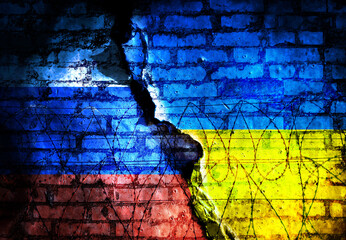 Wall Mural - Repeated exposure of Russian and Ukrainian flags with physical fence barbed wire and brick wall. Conceptual image of Russia's occupation of Ukraine. Double exposure creative hologram.