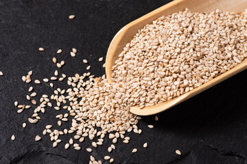 Wall Mural - close up of sesame seeds on table