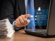 © meeboonstudio - Businessman touching login button to the network system on a virtual screen