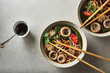 Asian soup with buckwheat noodles and mushrooms. Asian soba noodles with mushrooms menu recipe for diet or detox.