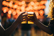 © Zamrznuti tonovi - Hands of friends holding beer and toasting on a music festival