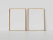 Two Wooden Frames Leaning On White Floor In Interior Mockup. Template Of Pictures Framed On A Wall 3D Rendering