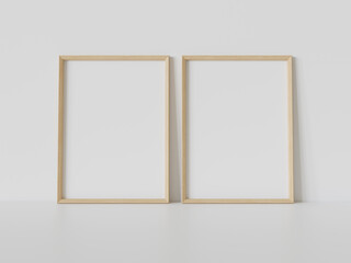 Aufkleber - Two wooden frames leaning on white floor in interior mockup. Template of pictures framed on a wall 3D rendering