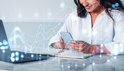 Poster - Young attractive businesswoman wearing white blouses is working on smartphone