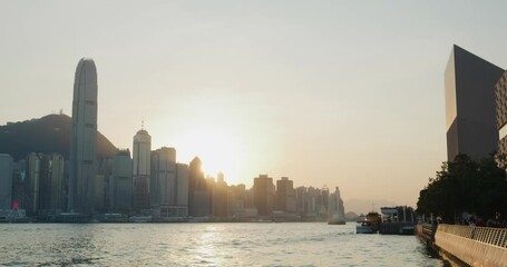 Fototapete - Hong Kong water promenade at sunset