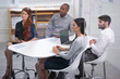 © Marius V/peopleimages.com - Paying close attention to the presentation. Shot of a group of young business professionals sitting at a conference table.