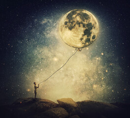surreal and inspirational scene with a person holding the full moon as a balloon with a rope. dreaml