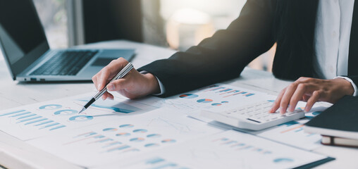 Business analyst checking in financial statement for audit internal control system. Accounting and Financial Concept.