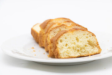 Wall Mural - some slices of pound cake over on white background