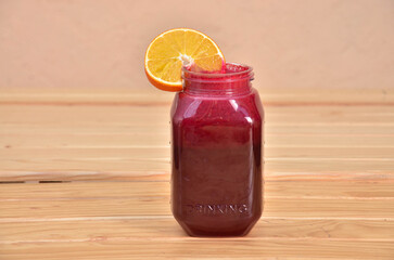 Canvas Print - Closeup shot of the Sangria drink on the wooden background