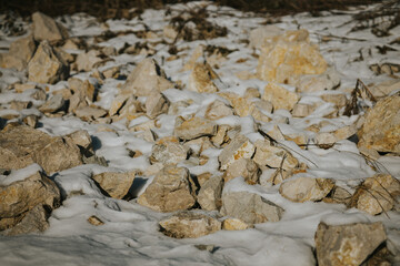 Poster - Beautiful shot of a bunch of stones covered in snow in winter