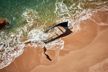 Poster - Top view of Barbate Beach in Cadiz, Spain and an abandoned boat