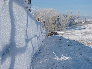 Sticker - Frozen chain link fence in a field during winter