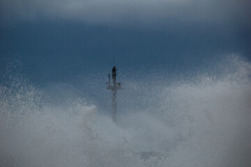 Wall Mural - photo of a heavy storm at the gates to the port of klaipeda, lithuania the baltic sea