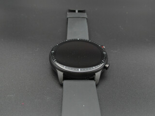 Sticker - Closeup shot of smart watch isolated on gray background