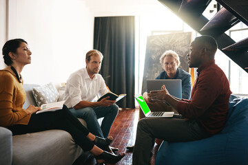 Poster - Shifting business from the ordinary to the extraordinary. Shot of a diverse group of designers brainstorming together in an office.