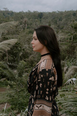 Poster - Portrait of beautiful young woman in Bali jungles during yoga retreat. Tropical Bali lifestyle