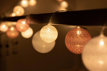 Sticker - Closeup of a roof decorated with bright light garland